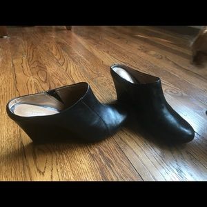 Clark’s black leather mules. Size 8